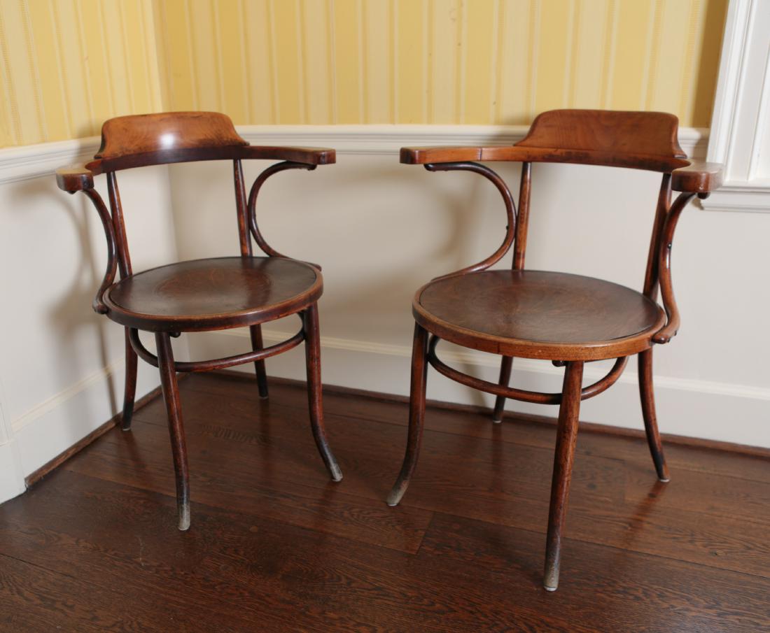 ANTIQUE BENTWOOD ARMCHAIRS, MANNER OF THONET: Dimensions: H 35.5” x W 24.5” x D 21.5” x SH 19” Condition: Some finish wear. Small loss and some splitting to one front leg. Few small losses to inside edge of seat of one chair.