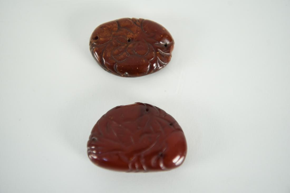 (2) CHINESE CARVED CHERRY AMBER DECORATIONS (1 of 6)