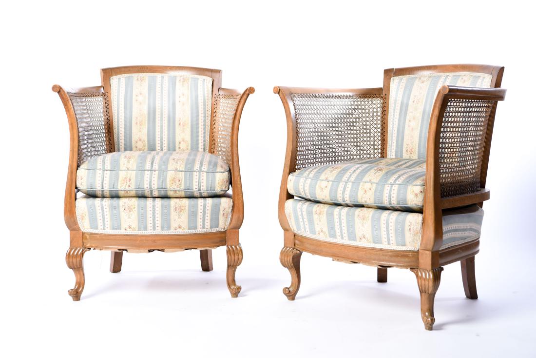 PAIR OF FRENCH CANED BERGERE CHAIRS: Dimensions: H 32" x W 26.5" x D 24", SH 17" Condition: Some finish wear, nicks, and dings to wood. Wear consistent with age and use. WPC006