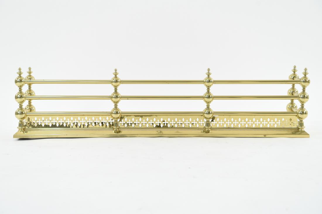 1920S BRASS TRIPLE ROW FIRE FENDER: Dimensions: H 12.25" x W 52" x D 12" Condition: Very light surface wear consistent with use.