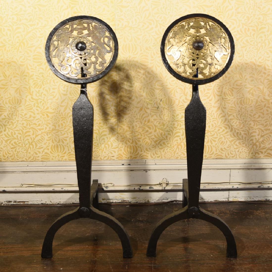 PAIR VINTAGE CAST IRON MEDALLION ANDIRONS: Black painted, gold finished, lion medallions. Dimensions: H 30" x W 12" x D 13.5" Condition: No issues to note.