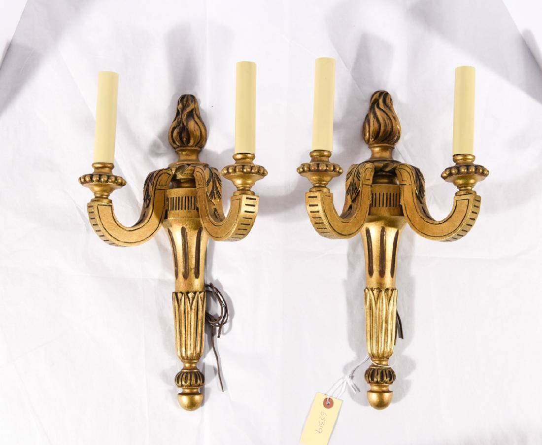 PAIR OF VINTAGE CARVED WOOD TORCHIERE FORM SCONCES: Antiqued gold surface. Dimensions: H 17" x W 9" x D 9.25" Condition: No issues to note.