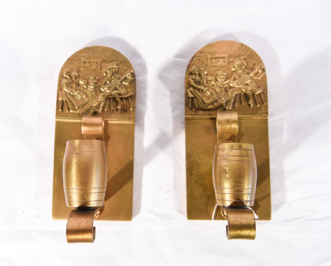 PAIR OF 1920S WHISKEY BARREL SCONCES: Brass with pictorial design and whiskey barrel fittings Dimensions: H 9.5" x W 4.5" x D 5" Condition: Aged surface.