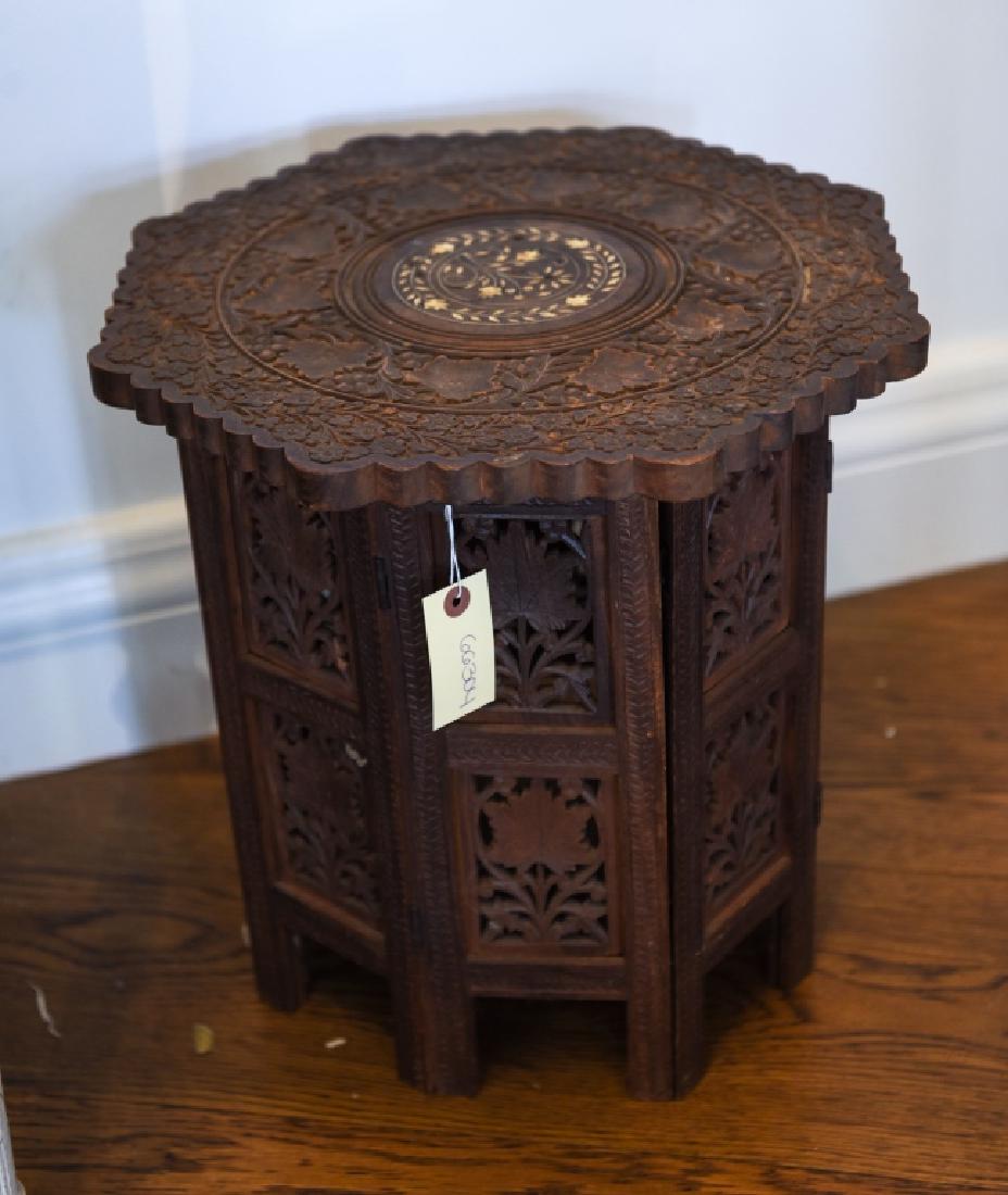 INDIAN CARVED WOODEN TABLE WITH INLAY: Dimensions: H 15.25" x Dia. 16" Condition: Some edge wear including couple small losses to inlay.