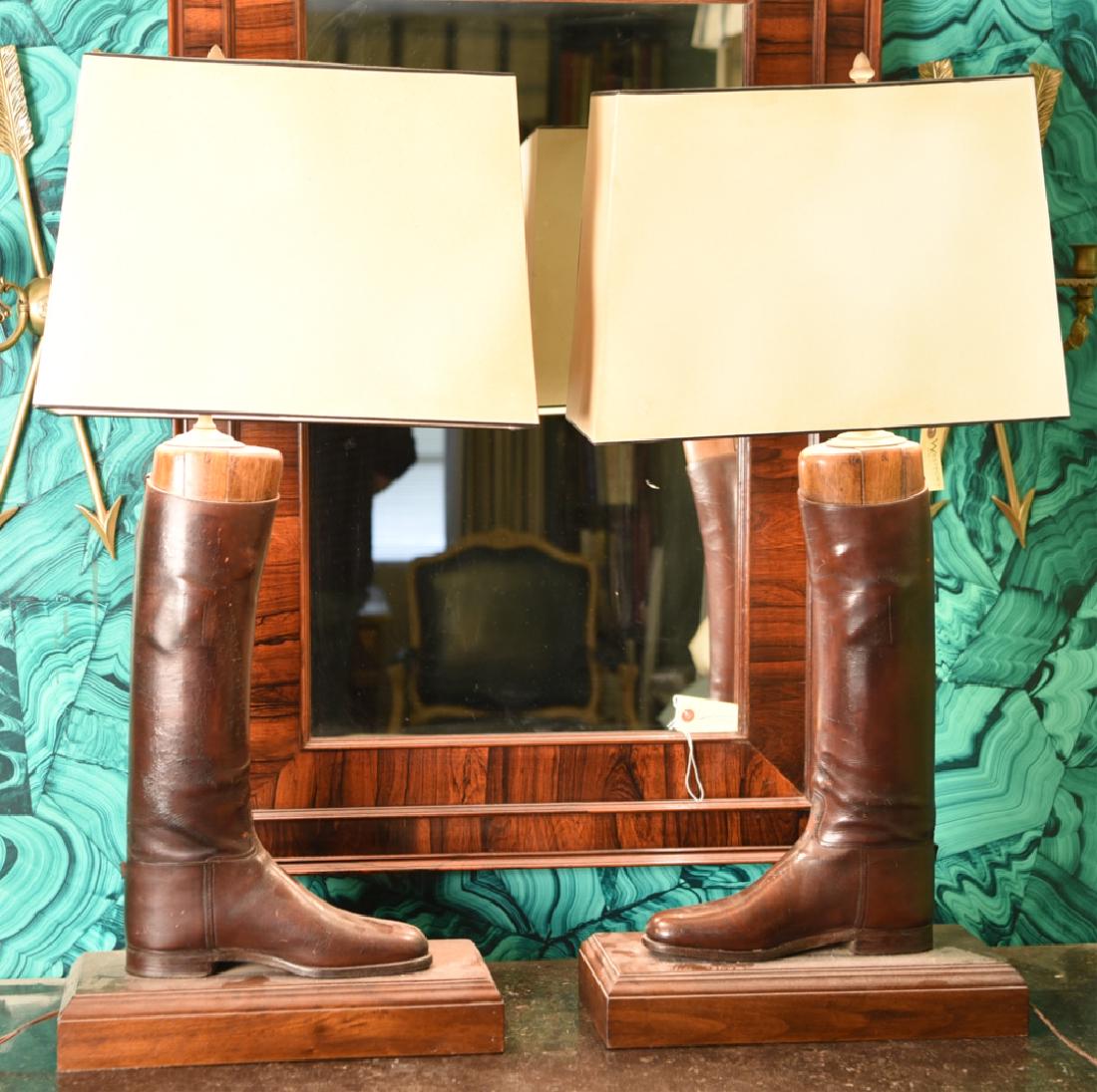 PAIR OF LEATHER RIDING BOOTS / STRETCHERS AS LAMPS: Dimensions: H (to of finial) 36.25" x (Base) W 15.5" x D 6.5" Condition: Some wear to leather. May need new shades, splits at seams.