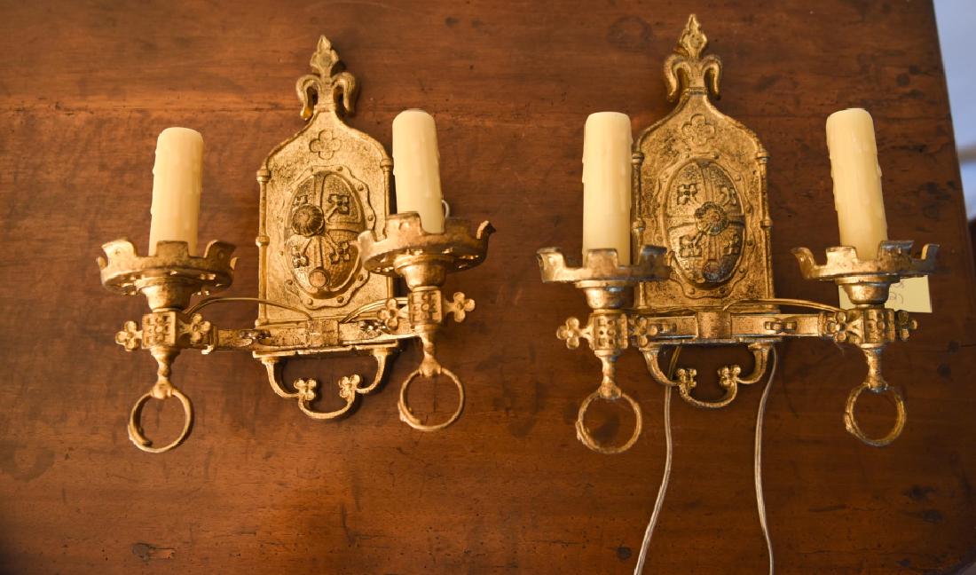 PAIR OF 1920S SPANISH REVIVAL WALL SONCES: Two-light sconces with faux antiqued gold surface. Dimensions: H 12" x W 10" x D 6" Condition: No issues to note. Rewired.