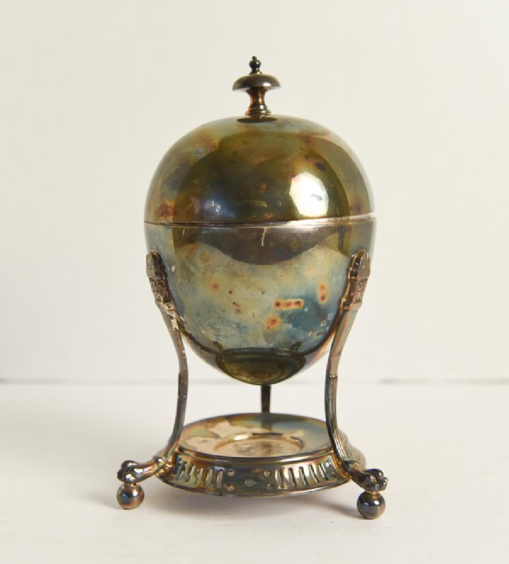 VICTORIAN SILVER PLATE EGG WARMER: Marked underneath. Dimensions: H 8.5" x Dia. 5" Condition: Heavily tarnished.