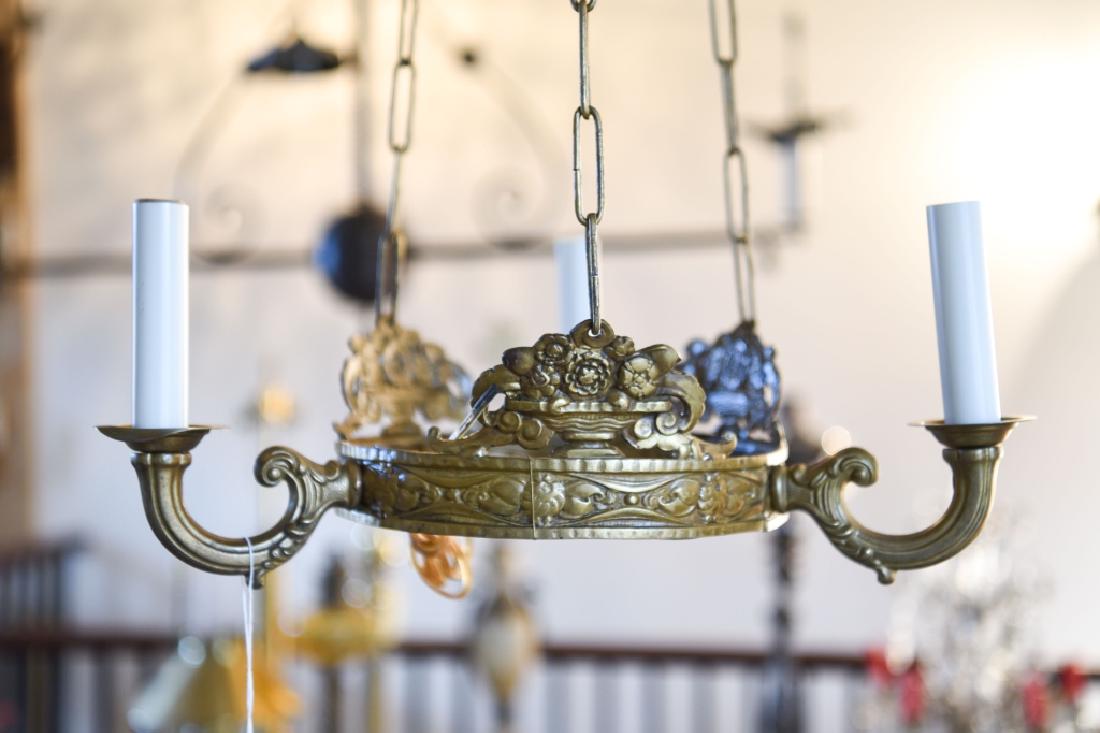 VINTAGE 18TH C. STYLE CHANDELIER: Faux antiqued metal, three-light. Dimensions: (To canopy) H 24.5" x D 15" Condition: No issues to note.