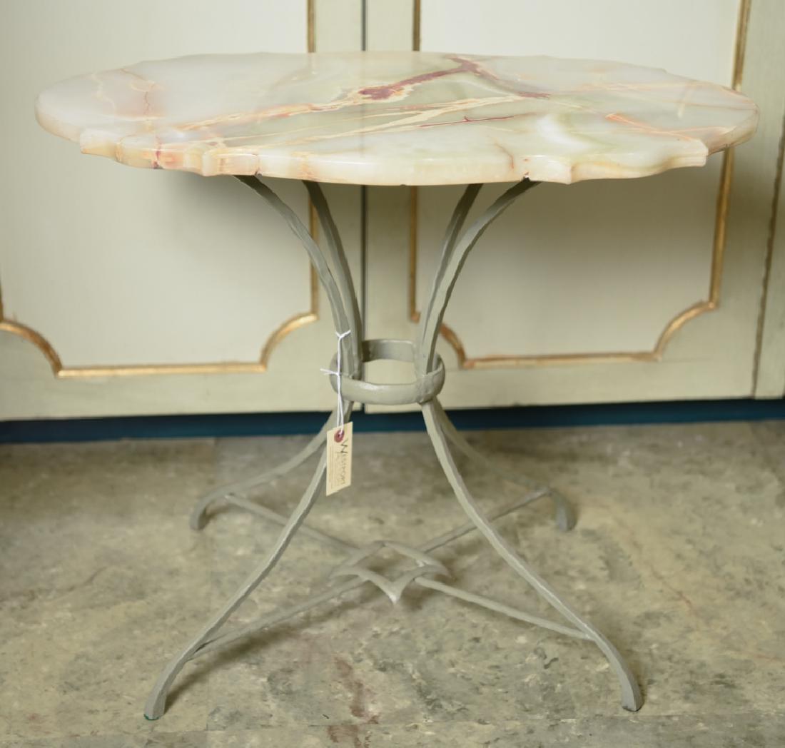 WROUGHT IRON & ONYX MARBLE SIDE TABLE: Dimensions: H 22.25" x W 26" x D 16" Condition: Few small chips and flea bites to edge of marble.