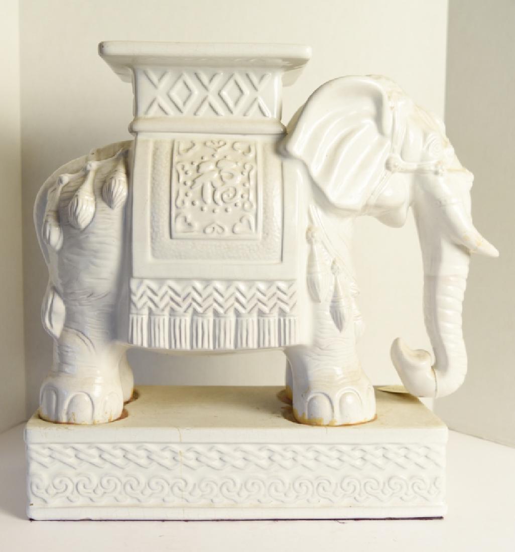 VINTAGE CHINESE CERAMIC ELEPHANT GARDEN SEAT: Dimensions: H 19.15" x W 20.5" x D 8" Condition: Some crazing to glaze. Remnants of glue at elephant's feet where meets base.