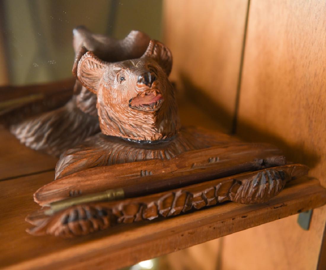 CARVED BLACK FOREST BEAR INKWELL PEN HOLDER: Dimensions: H 3.25" x W 7.25" x D 4.25" Condition: Writing implement without nib.