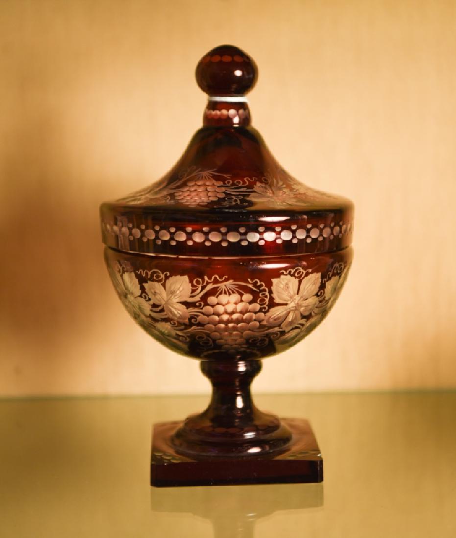 BOHEMIAN GLASS COVERED BOWL: Dimensions: H 9" x Dia. 5.25" Condition: Flea bite and small chip to rim of lid. Couple flea bites and small chip to edge of base.