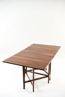 BENDT WINGE DROP LEAF ROSEWOOD TABLE C. 1960: Dimensions: (Closed) H 29" x W 8" x D 34", (Fully open) W 58" Condition: Some light surface scratches. Wear consistent with age and use. WPC061