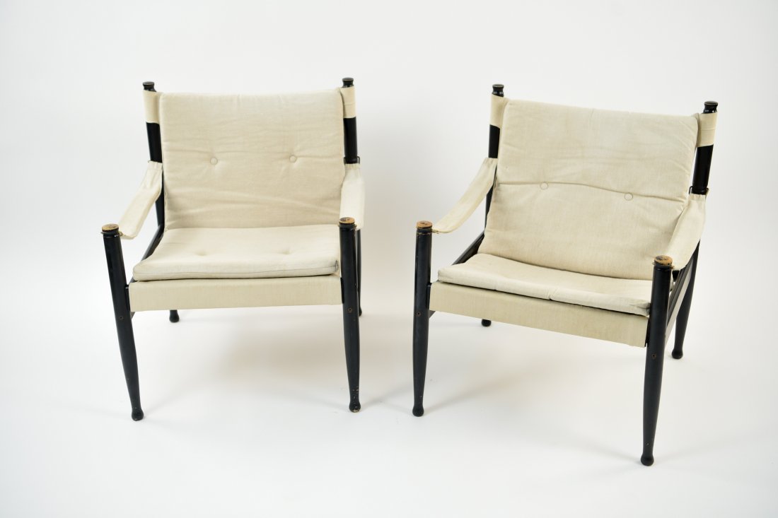 PAIR OF ERIK WORTS FOR NIELS EILERSEN CHAIRS: Model 30 Safari chairs. Dimensions: H 30" x W 25" x D 24" x SH 16" Condition: Signs of normal wear, minor paint wear on handles, minor scratches and marks to wood. WPC046