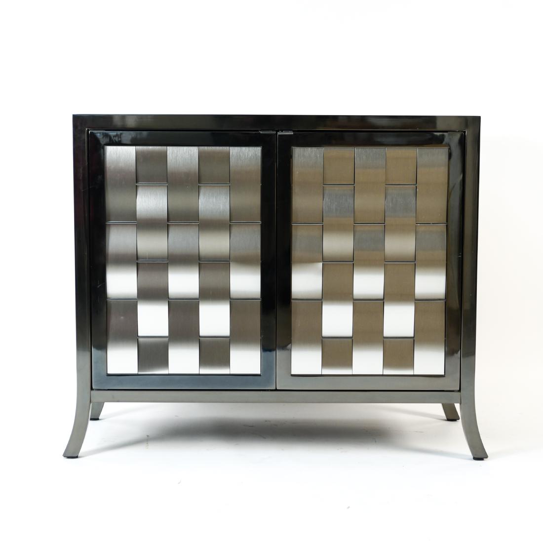 DIA DESIGN INSTITUTE OF AMERICA CABINET: Gun metal finish. Dimensions: H 35.25" x W 41" x D 20" Condition: Missing two pins to hold interior shelf. Dent to one metal strip on front. Few surface scratches.