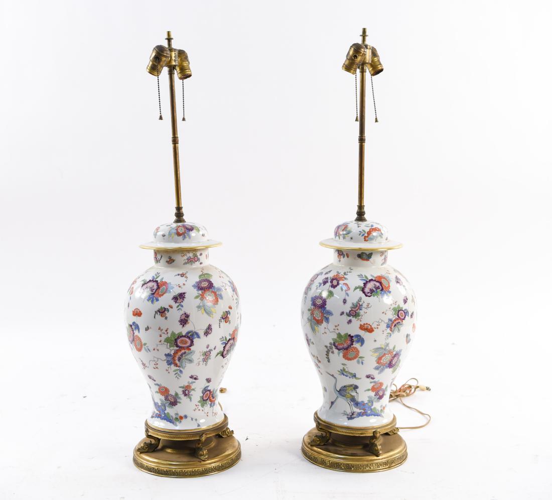 PAIR OF PORCELAIN GINGER JAR LAMPS: C. 1940's. Dimensions: H 38" x Dia. 10" Condition: Slight tarnish to metal.
