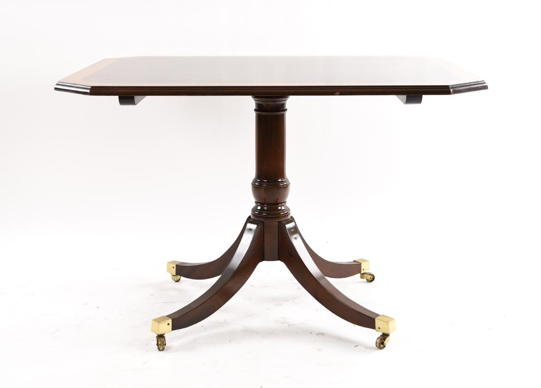 MADISON SQUARE MAHOGANY FLIP TOP TABLE: Dimensions: H 28.5" x W 42" x D 34" Condition: Some chips and scuffs to one edge. Small loss to one edge. Few dings.