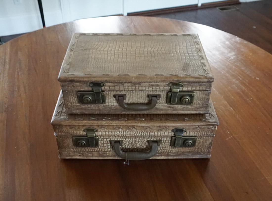 PAIR OF FAUX CROCODILE SUITCASES: Dimensions: H 11" x W 18.5" x D 13" Condition: Wear consistent with age and use.