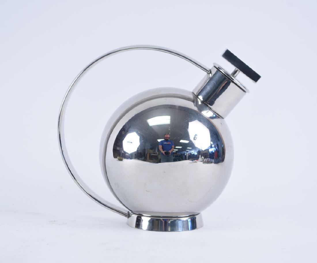 MARIANNE BRANDT ALESSI BAUHAUS COCKTAIL SHAKER: Signed Alessi to inner handle. Dimensions: H 7.5" x W 8.25" x D 5.25" Condition: Showing few light surface scratches.