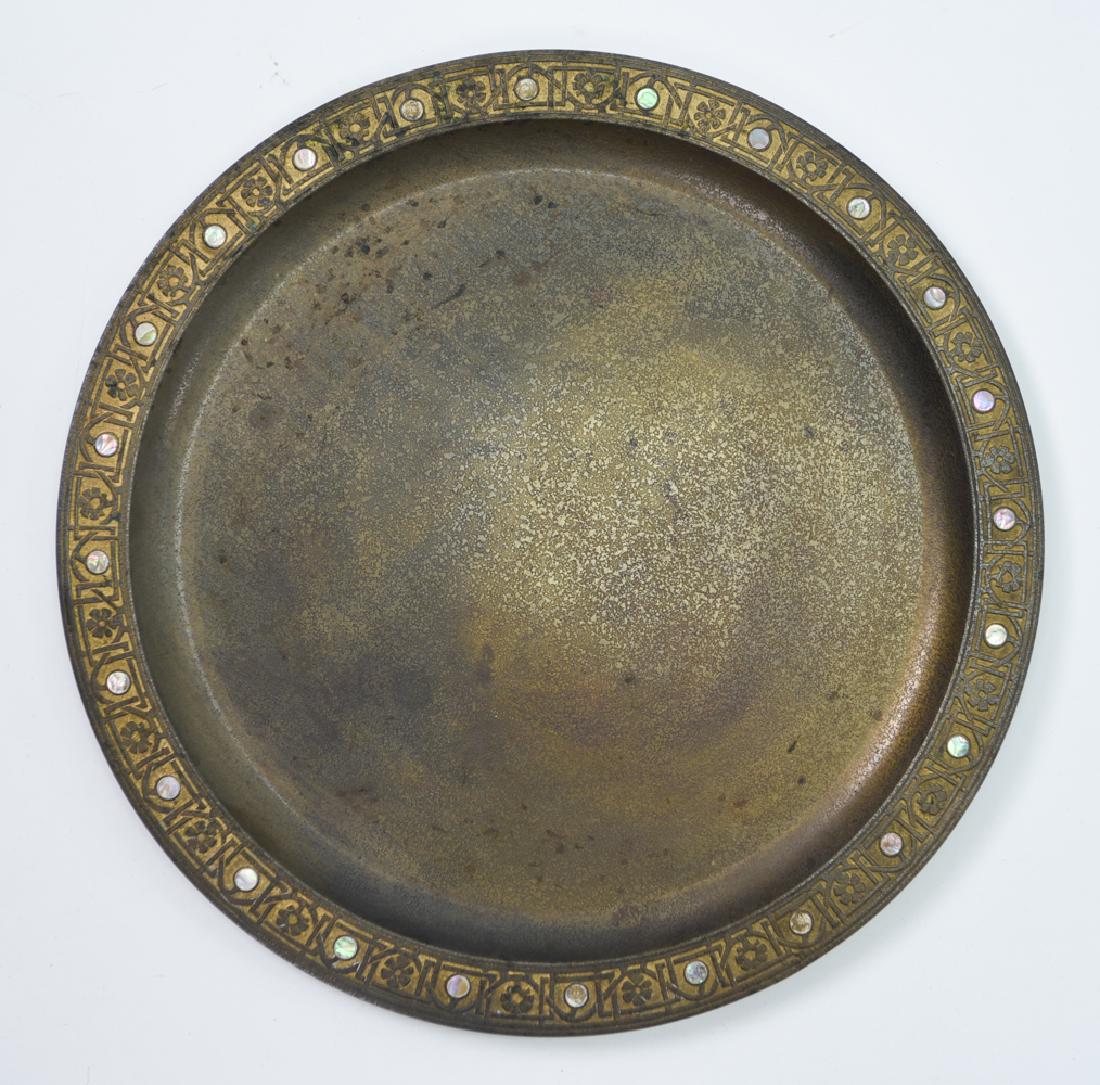 TIFFANY STUDIOS BRONZE ABALONE SERVING TRAY: Marked Tiffany Studios.Dimensions: H .5" x D 14"Condition: Missing 4 abalone discs. Showing finish wear and areas of tarnish.