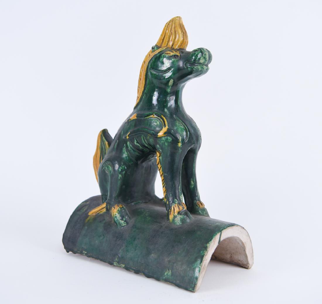 19TH C. CHINESE ROOF TILE: In grain and straw glaze, of a qilin. Dimensions: H 14" x W 6" x D 10.75" Condition: Few small nicks to some edges and points. Surface dirt.