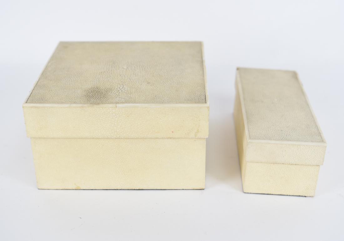 (2) 1960S SHAGREEN BOXES: Marked R&Y Augousti, Paris on underside. Dimensions: (Larger) H 4.25" x W 7.75" x D 7.75" Condition: Some surface dirt. Couple chips and small losses to smaller box lid. Some lifting at corners of lar