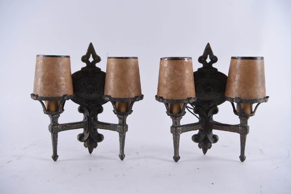 PAIR OF ARTS & CRAFTS IRON SCONCES W/ MICA SHADES: Faux antiqued surface. Renaissance revival style. Dimensions: H 11" x W 10" x D 5" Condition: Need rewiring.
