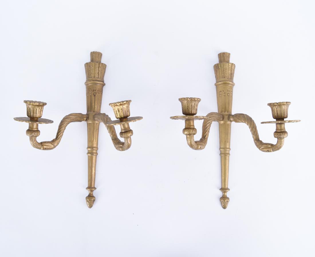 PAIR OF PATINATED BRASS WALL CANDLE SCONCES: Dimensions: H 13" x W 9" x D 6" Condition: Faux distressed surface.