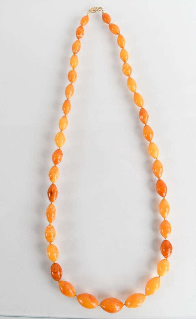 ANTIQUE LONG EGG YOLK AMBER BEAD NECKLACE (1 of 10)