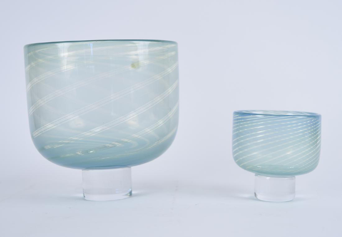 (2) ORREFORS ART GLASS BOWLS: Signed and dated on base. With Orrefors Sweden decal on base of both. Dimensions: (Larger) H 8.25" x Dia. 8.25" Condition: Some surface dirt.
