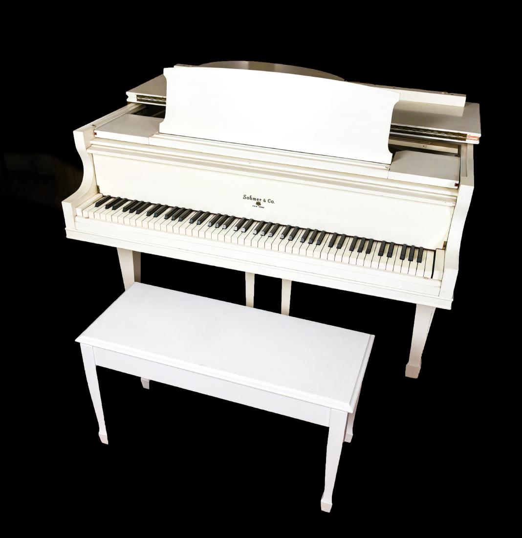 SOHMER & CO. BABY GRAND PIANO: Includes piano bench. Dimensions: H38.5" x W54.5" x D60.5" Condition: Scuff, scratches, repainted, and could use tuning. All keys work. Pedals work.