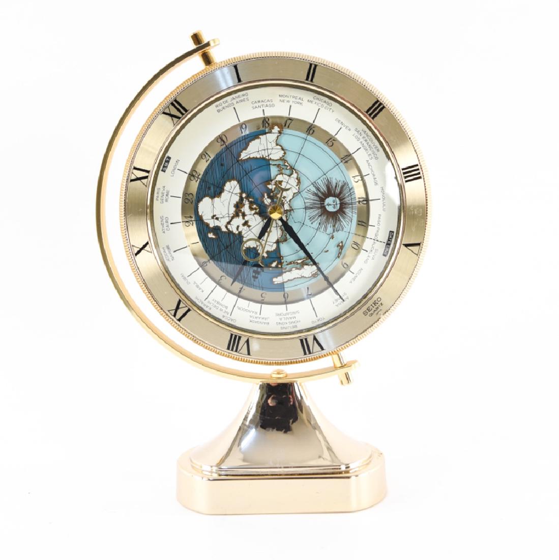 SEIKO CLOCK: Dimensions: H 12" x W 8.5" x D 3.25" Condition: Not tested for timekeeping. Light scuffs around base. Provenance: From a Greenwich, CT estate.