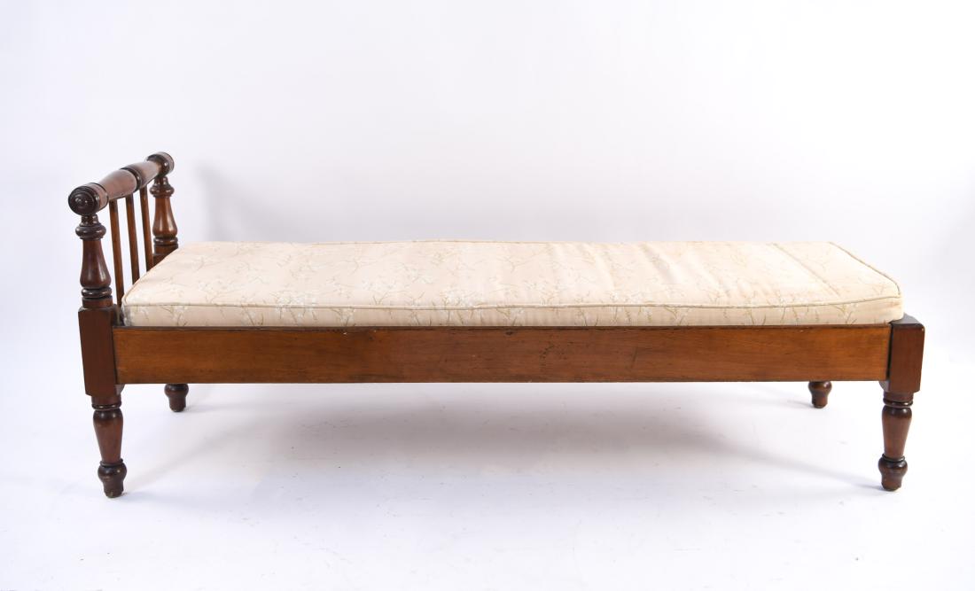 ANTIQUE DAY BED: Dimensions: H 26" x W 65" x D 23" Condition: One slat loose. Fading to cushion. Few stress cracks. Surface wear to wood.