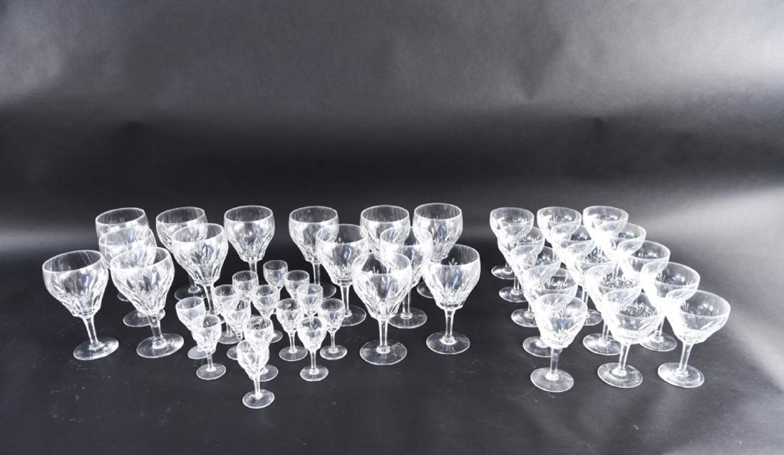 CUT CRYSTAL DRINK SERVICE: 14 Cordial, 14 Wine, 14 Goblet, 1different size; 43 total Dimensions: H 6.5" x D 4" Condition: One of the cordial glasses has a repair to the stem, still a chip in the stem. Provenance: From a Greenwi