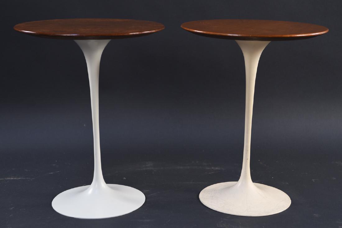 PAIR OF SAARINEN FOR KNOLL DRINK STANDS: Tagged Knoll under top. Dimensions: H 20" x D 16" Condition: Small losses, scuffs, and scratches to base. Top has peeling to finish.