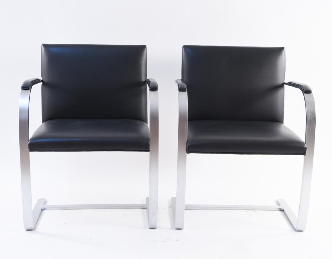 PAIR OF MIES VAN DER ROHE FOR KNOLL BRNO CHAIRS: Stamped under arm rest. Dimensions: H 31" x W 23" x D 23" x SH 17.5" Condition: Showing very light wear.