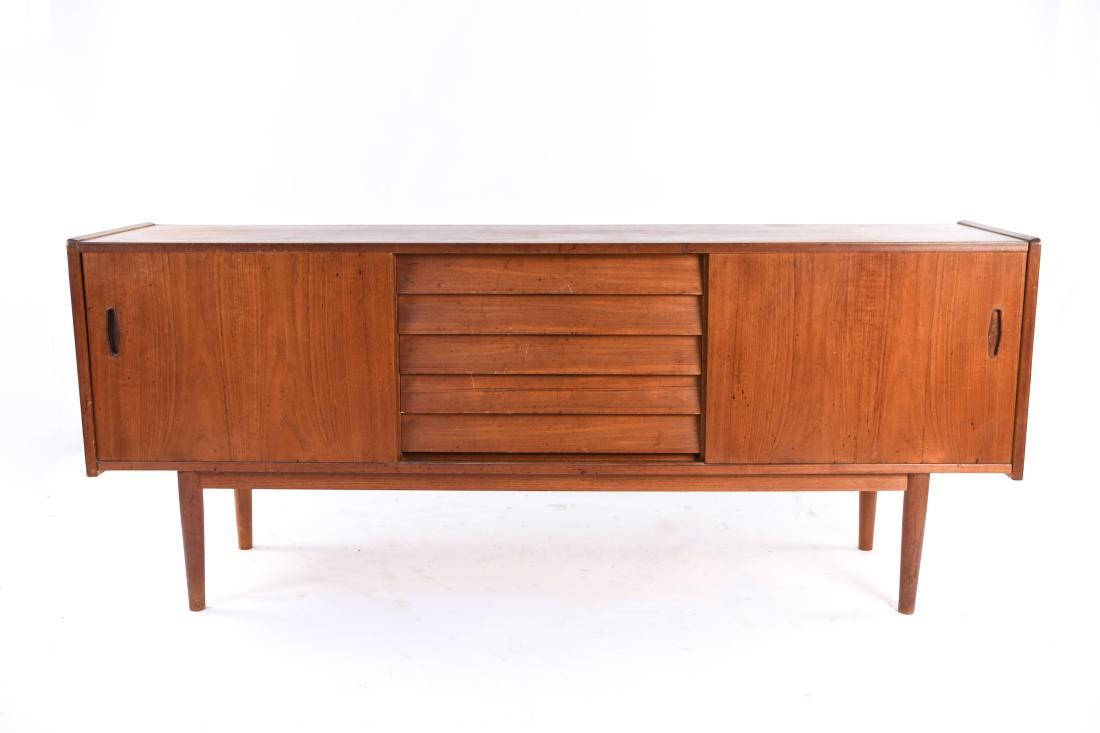 DANISH DUX TEAK SIDEBOARD: Marked on bottom: Dux. Dimensions: H 31" x W 76.25" x D 17.75" Condition: Finish water, water marks, chips, nicks, and dings. Surface wear throughout.