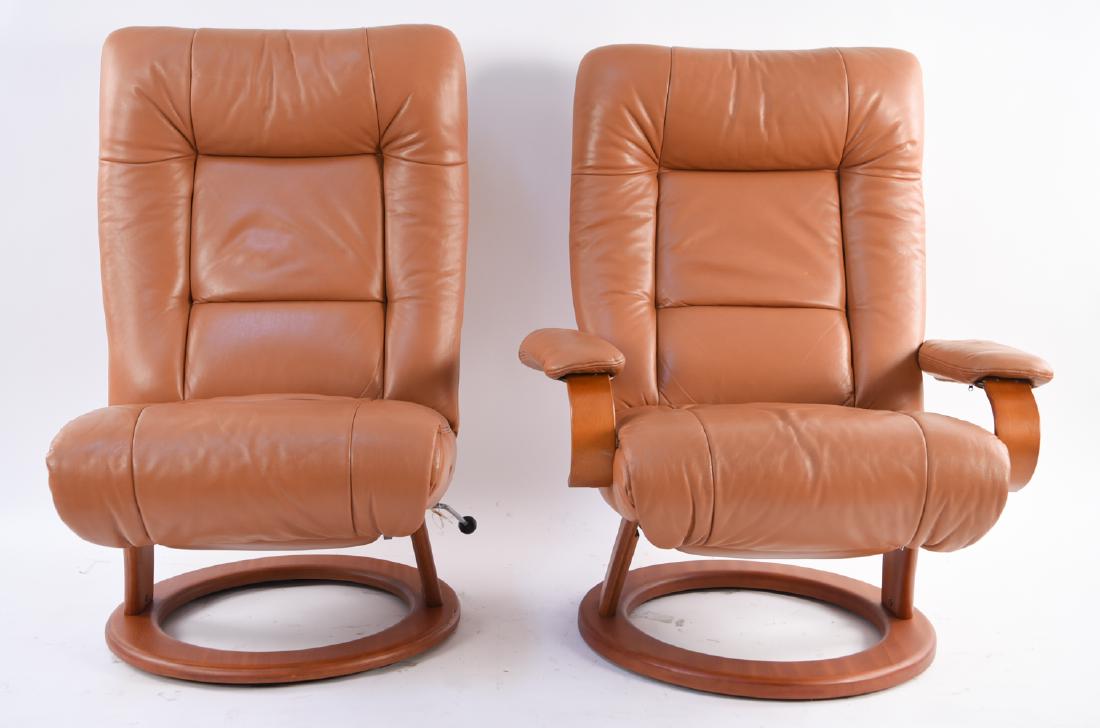 PAIR OF EKORNES RECLINING LOUNGE CHAIRS: Provenance: From a Greenwich, CT estate. Dimensions: H 42" x W 32" x D 26" x SH 15" Condition: Showing light overall wear. Only one chair with arm rests. Showing wear to underside corners of arm rests