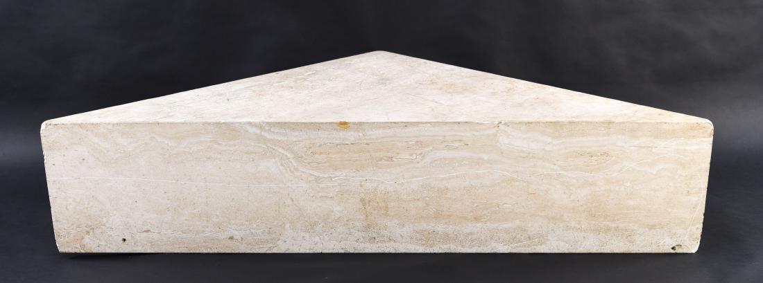 TRAVERTINE CORNER TABLE: Dimensions: H 12.5" x W 54" x D 27.5" Condition: Chips, scratches, and marks.