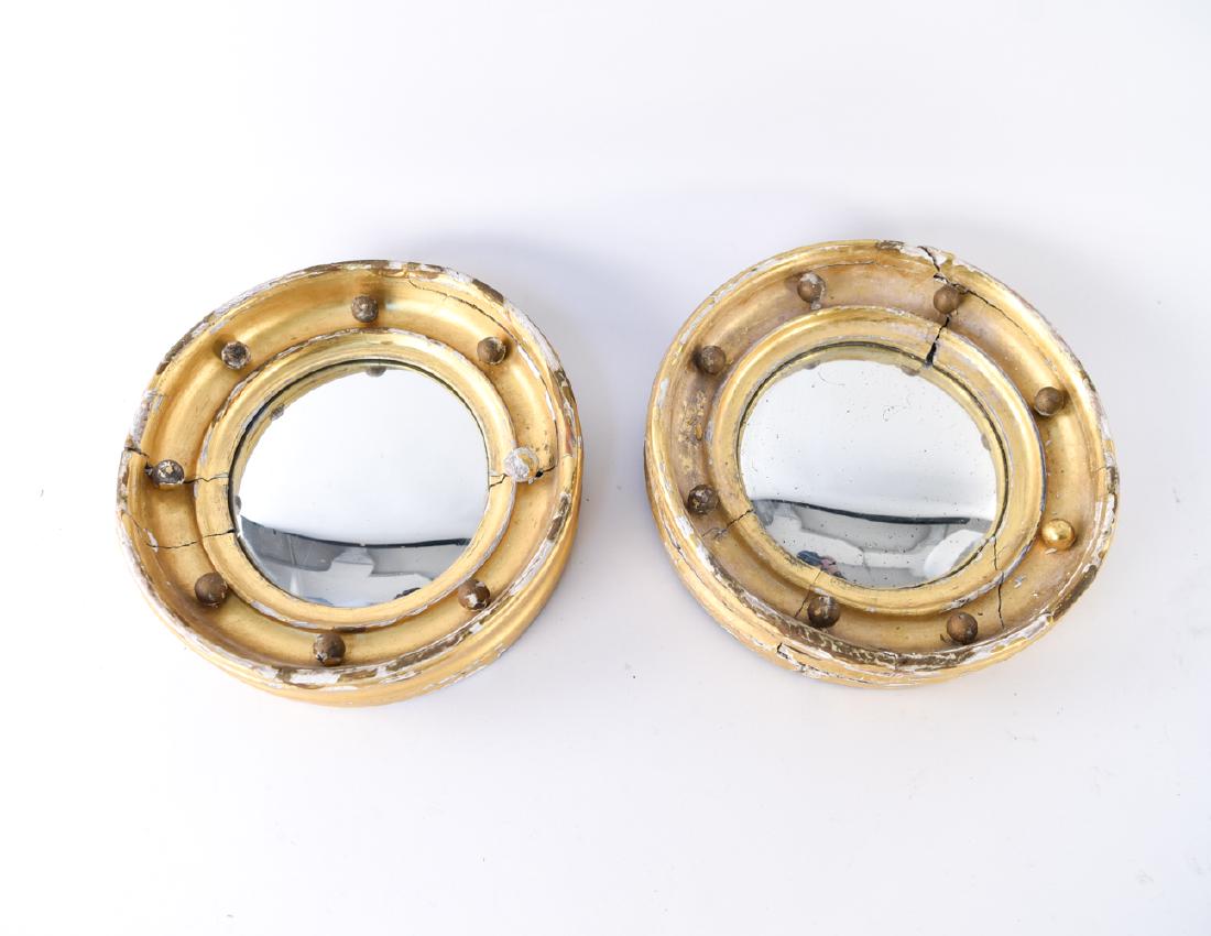 PAIR OF 19TH CENTURY MINIATURE BULLSEYE MIRRORS: Dimensions: Dia. 9" x D 2" Condition: As is. Loose ball elements, cracks, losses to gilding.