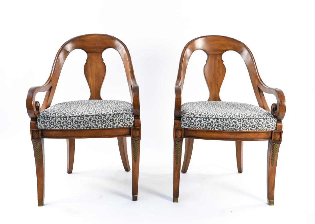 PAIR OF ARM CHAIRS: With ormolu accents and brass foot caps on front legs. Dimensions: H 34.5" x W 21" x D 25" x SH 18.5" Condition: Showing light overall wear. Few rubs and dings.