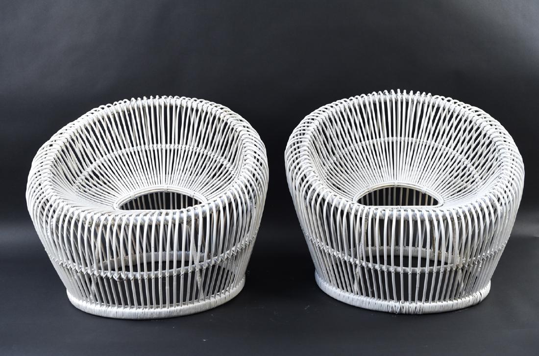 (2) ATTR. FRANCO ALBINI ITALIAN RATTAN CHAIRS: Dimensions: H 28" x W 34" x D 28" x SH 15" Condition: painted white, Some paint loss.