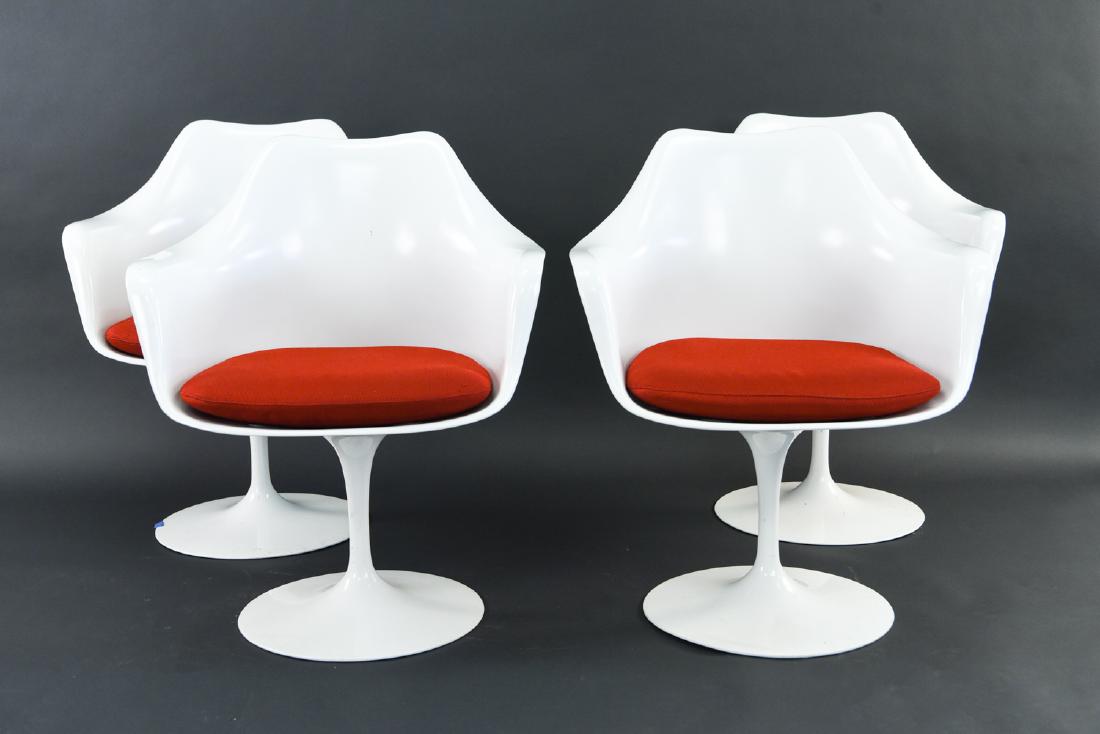 (4) EERO SAARINEN KNOLL STUDIOS TULIP ARMCHAIRS: Tagged under base(s) Knoll Studios, Eero Saarinen, 1956. Dimensions: H 31.5" x W 26.5" x D 23.5" x SH 18" Condition: One chair without a tag on base or seat cushion. Showing light scratches and scuffs