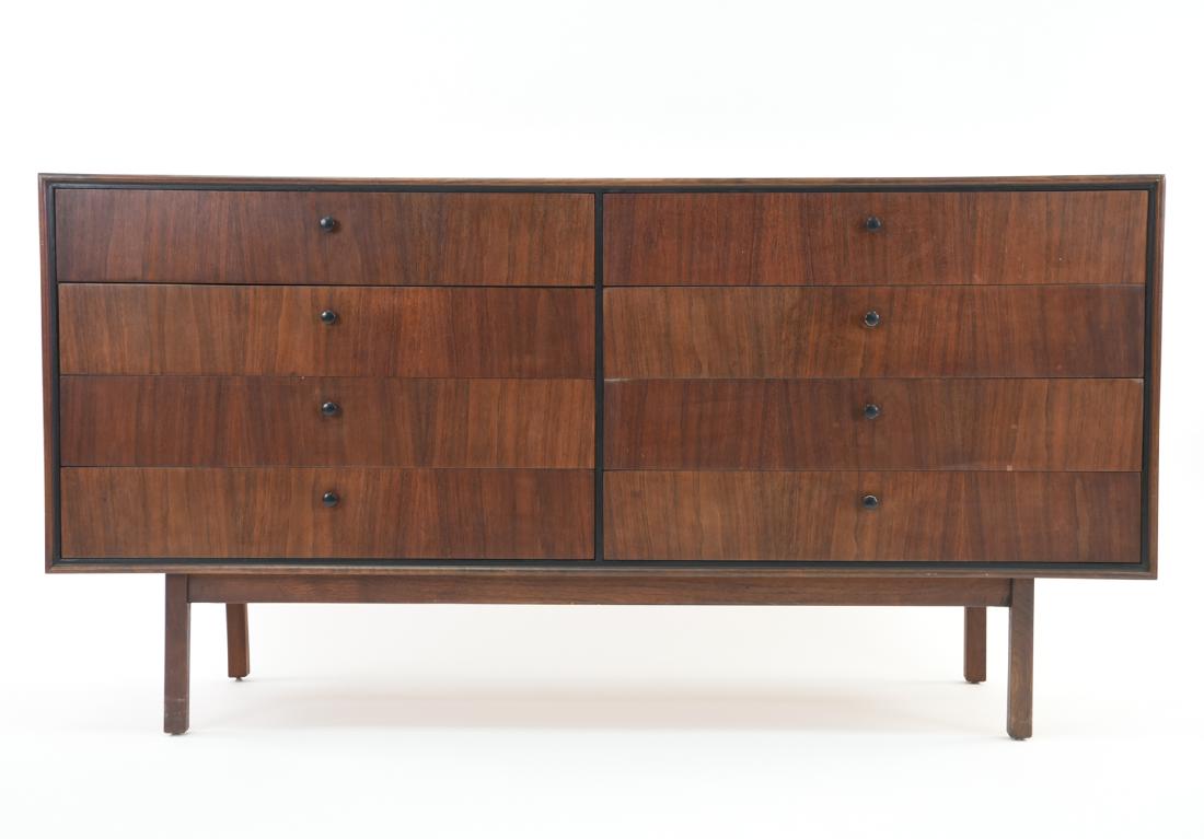 JACK CARTWRIGHT FOR FOUNDERS DRESSER & MIRROR: Matched-grain walnut with ebony trim by Jack Cartwright for Founders. 1960s. Dimensions: (Dresser) H 31" x W 60" x D 18" Condition: Wear consistent with age and use.