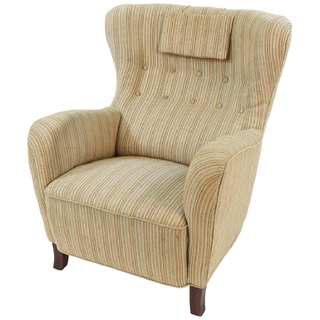 FLEMMING LASSEN STYLE DANISH EASY CHAIR: Dimensions: H 38" x W 33" x D 36" x SH 17" Condition: Minor soiling to upholstery from use, otherwise good condition with early upholstery. WPB242