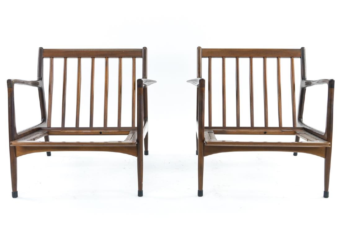 PAIR OF IB KOFOD LARSEN, SELIG LOUNGE CHAIR FRAMES: Walnut. Tagged on frame. Dimensions: H 27" x W 30" x D 321" x SH 12" Condition: Couple light marks and rubs.