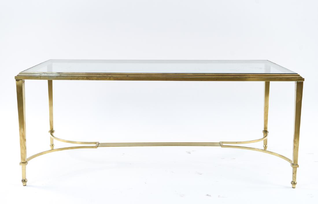 BRASS AND GLASS COFFEE TABLE: Dimensions: H 17.25" x W 41.5" x D 21.5" Condition: Showing some areas with finish wear.
