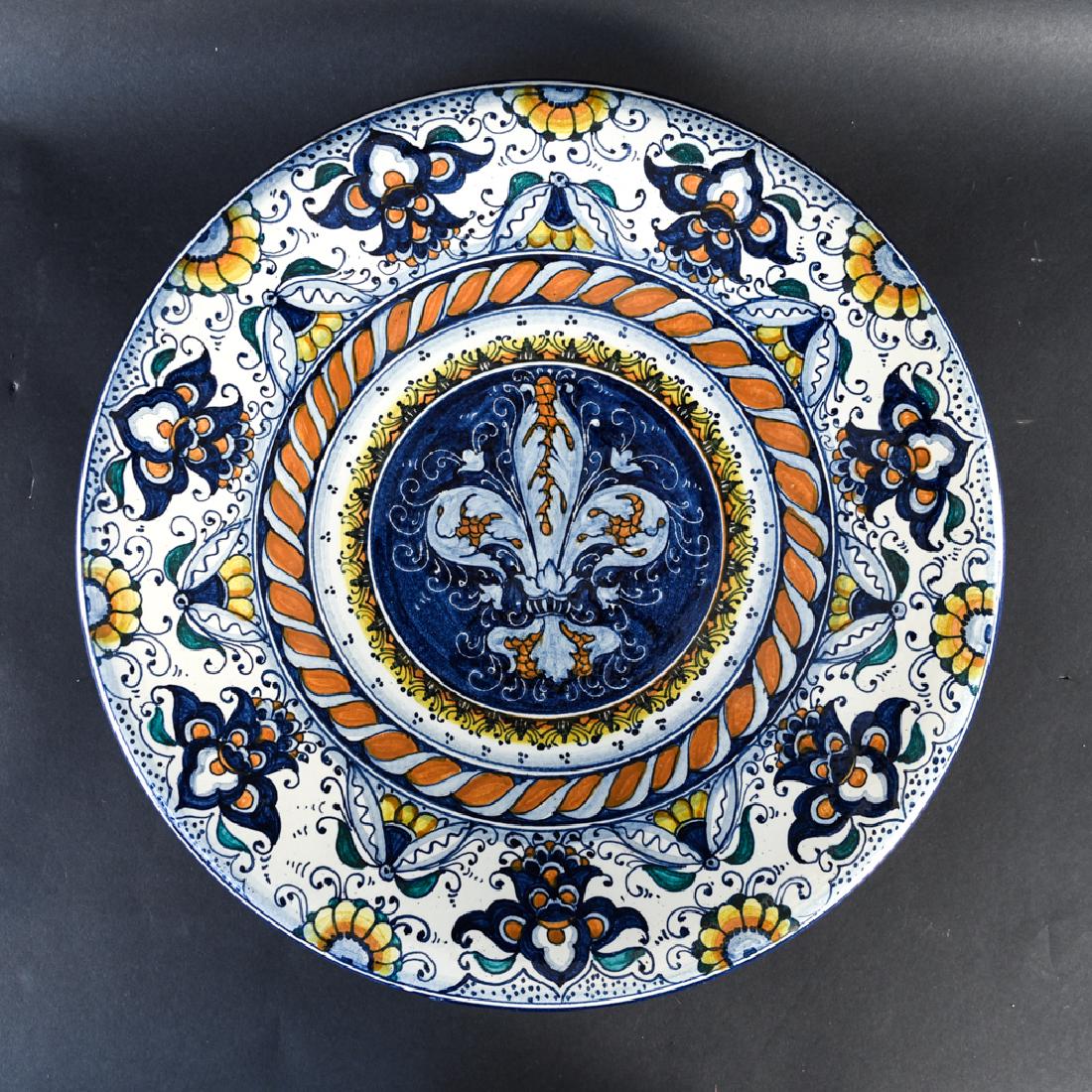 LARGE VINTAGE ITALIAN RENAISSANCE STYLE CHARGER: Faience decorated charger. Unmarked. Dimensions: Diam. 20.75" x H 3" Condition: No issues to note.