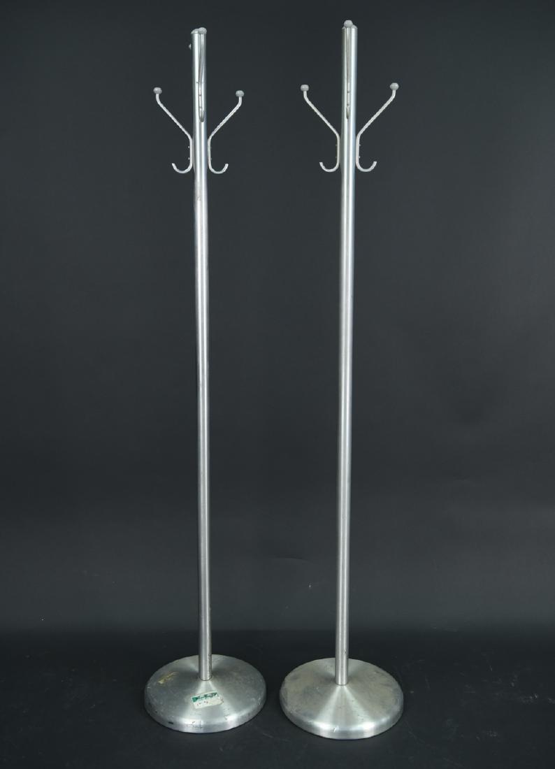 (2) VINTAGE ALUMINUM COAT RACKS: Dimensions: H 72" x D 13.5" Condition: Showing wear consistent with age and use. Some nicks and dings.