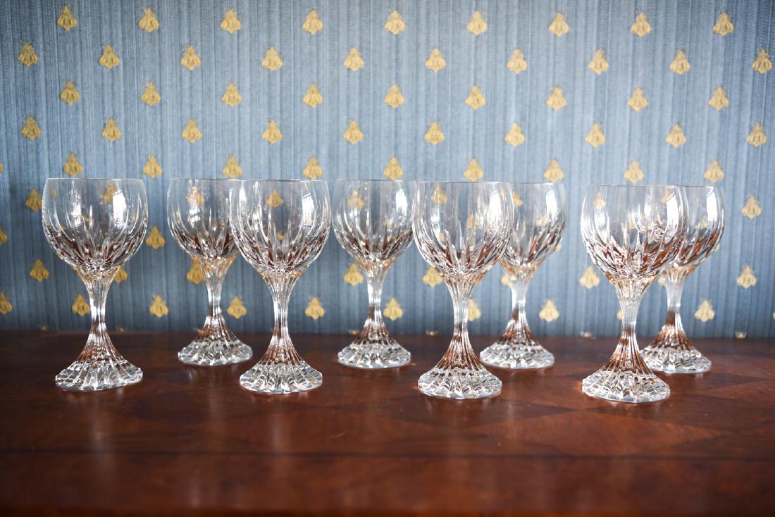 (8) BACCARAT CRYSTAL WINE GLASSES: Marked underneath. Dimensions: H 7" x Dia. 3.5" Condition: Light signs of use.